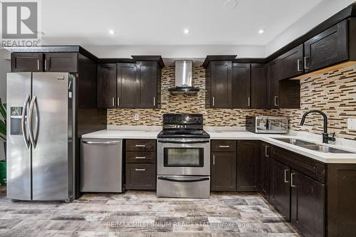 94 - 6950 Tenth Line W, Mississauga (Lisgar), ON - Indoor Photo Showing Kitchen With Stainless Steel Kitchen With Double Sink With Upgraded Kitchen