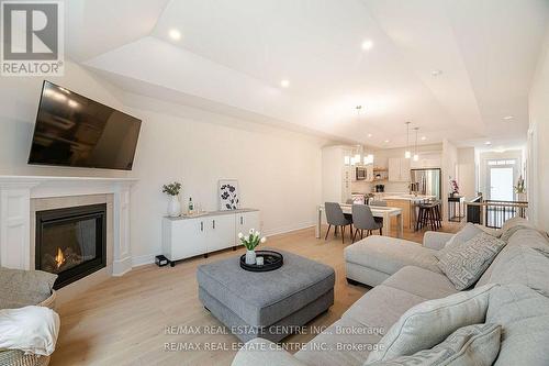 199 Alderson Court, Fort Erie, ON - Indoor Photo Showing Living Room With Fireplace