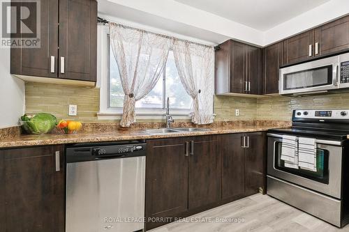 17 - 1415 Fieldlight Blvd Boulevard, Pickering, ON - Indoor Photo Showing Kitchen With Stainless Steel Kitchen With Double Sink With Upgraded Kitchen