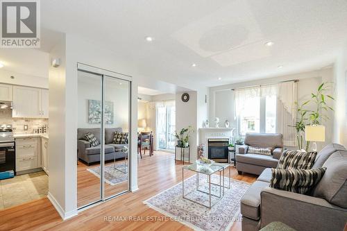 834 - 75 Weldrick Road E, Richmond Hill (Observatory), ON - Indoor Photo Showing Living Room With Fireplace