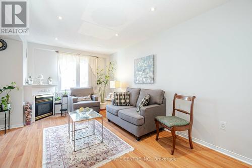 834 - 75 Weldrick Road E, Richmond Hill (Observatory), ON - Indoor Photo Showing Living Room With Fireplace