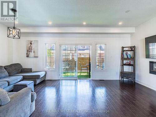 64 Boyces Creek Court, Caledon, ON - Indoor Photo Showing Living Room With Fireplace