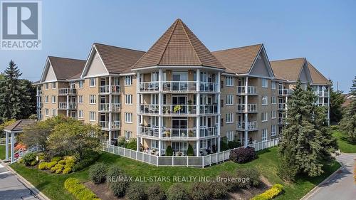 305 - 51 Rivermill Boulevard, Kawartha Lakes (Lindsay), ON - Outdoor With Balcony With Facade