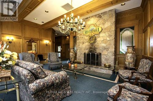 305 - 51 Rivermill Boulevard, Kawartha Lakes (Lindsay), ON - Indoor Photo Showing Living Room With Fireplace