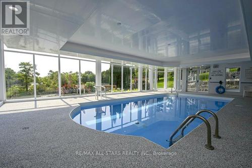 305 - 51 Rivermill Boulevard, Kawartha Lakes (Lindsay), ON - Indoor Photo Showing Other Room With In Ground Pool