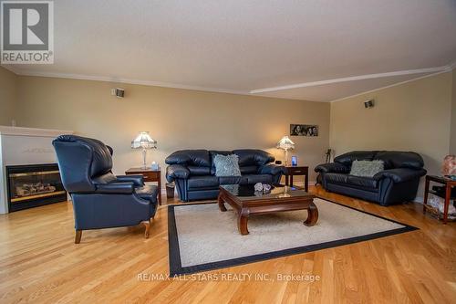 305 - 51 Rivermill Boulevard, Kawartha Lakes (Lindsay), ON - Indoor Photo Showing Living Room With Fireplace