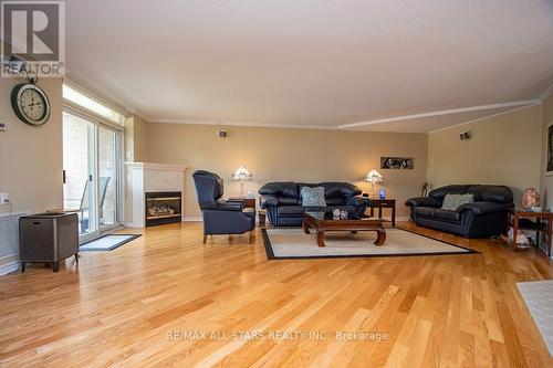 305 - 51 Rivermill Boulevard, Kawartha Lakes (Lindsay), ON - Indoor Photo Showing Living Room With Fireplace