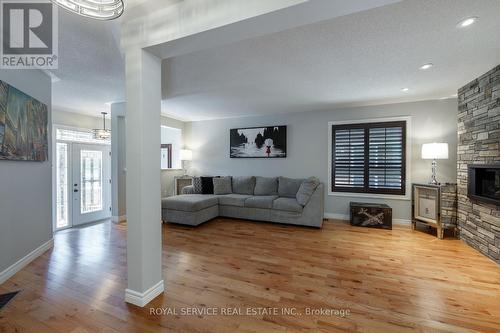 419 Spillsbury Drive, Peterborough (Otonabee), ON - Indoor Photo Showing Living Room With Fireplace