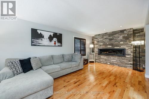 419 Spillsbury Drive, Peterborough (Otonabee), ON - Indoor Photo Showing Living Room With Fireplace