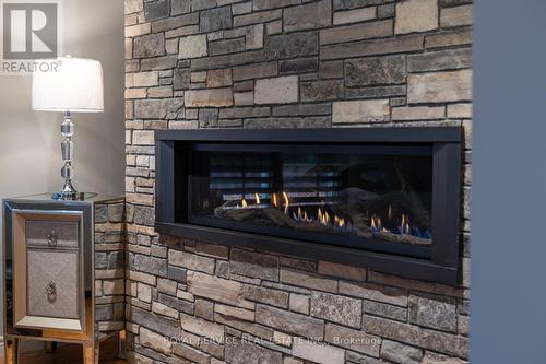 419 Spillsbury Drive, Peterborough (Otonabee), ON - Indoor Photo Showing Living Room With Fireplace