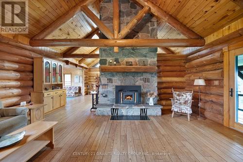 32062 Hwy 28 E, Bancroft, ON - Indoor Photo Showing Living Room With Fireplace