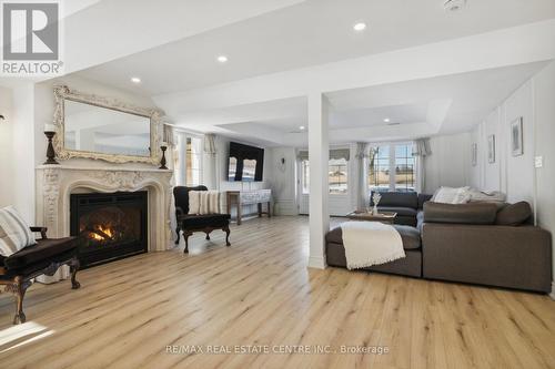 514369 2Nd Line, Amaranth, ON - Indoor Photo Showing Living Room With Fireplace