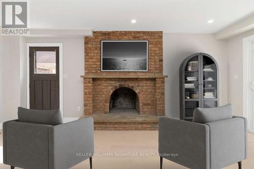 49 Spartan Avenue, Hamilton, ON - Indoor Photo Showing Living Room With Fireplace