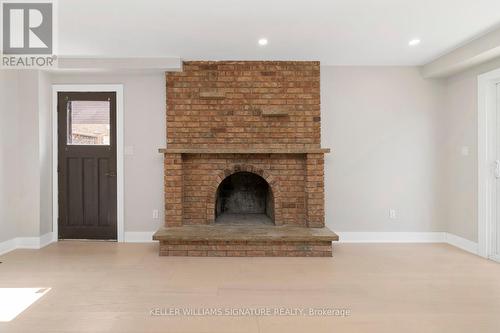 49 Spartan Avenue, Hamilton (Stoney Creek), ON - Indoor Photo Showing Living Room With Fireplace