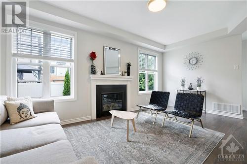 351 Meadowbreeze Drive, Ottawa, ON - Indoor Photo Showing Living Room With Fireplace