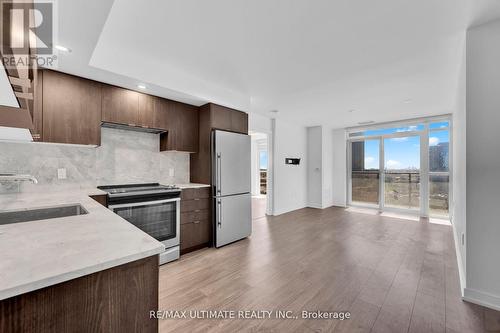 1006 - 225 Village Green Square, Toronto, ON - Indoor Photo Showing Kitchen With Upgraded Kitchen