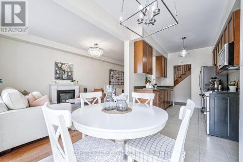 47 Hawkes Drive, Richmond Hill, ON - Indoor Photo Showing Dining Room With Fireplace