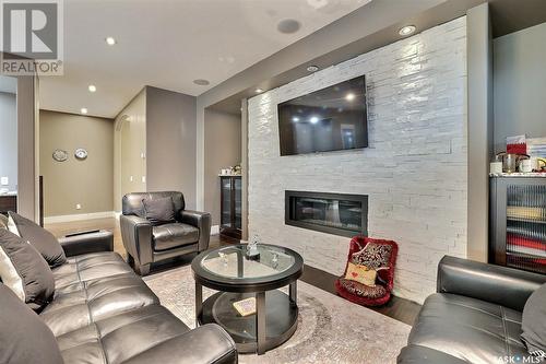 4613 Skinner Crescent, Regina, SK - Indoor Photo Showing Living Room With Fireplace