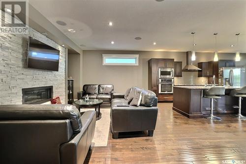 4613 Skinner Crescent, Regina, SK - Indoor With Fireplace