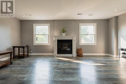 230 Chittick Crescent, Thames Centre (Dorchester), ON - Indoor Photo Showing Living Room With Fireplace