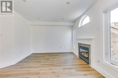 2254 Empire Crescent, Burlington (Orchard), ON - Indoor Photo Showing Other Room With Fireplace