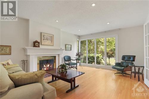 18 Kingsford Crescent, Kanata, ON - Indoor Photo Showing Living Room With Fireplace