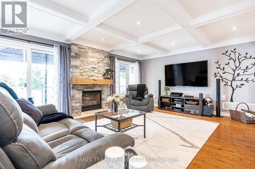 35 Princess Point Drive, Wasaga Beach, ON - Indoor Photo Showing Living Room With Fireplace