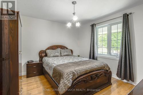 91 Mary Jane Road, Tiny, ON - Indoor Photo Showing Bedroom