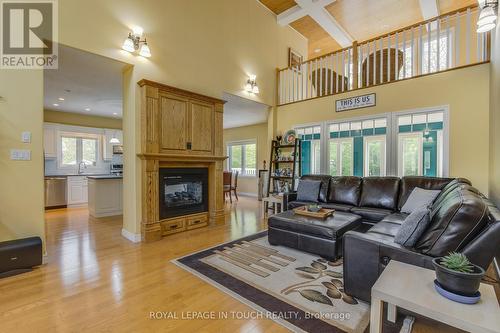 91 Mary Jane Road, Tiny, ON - Indoor Photo Showing Living Room With Fireplace