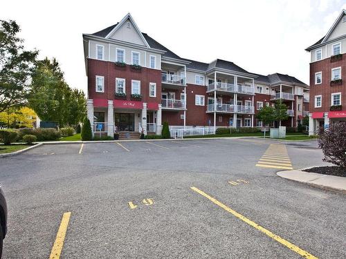 Stationnement - 105-1410 Av. De Rochechouart, Saint-Jérôme, QC - Outdoor With Facade