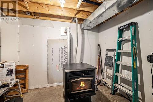 PELLET STOVE - 620 Highway 15 Highway, Lombardy, ON - Indoor Photo Showing Basement