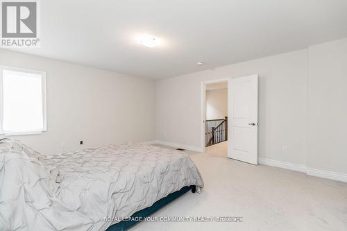 27 Lorne Thomas Place, New Tecumseth, ON - Indoor Photo Showing Bedroom