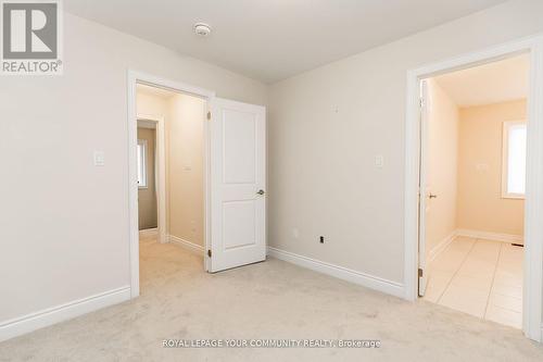 27 Lorne Thomas Place, New Tecumseth, ON - Indoor Photo Showing Other Room