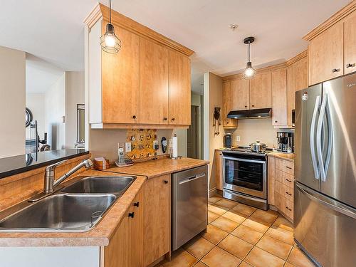 Kitchen - 101-60 Rue Du Lac, Magog, QC - Indoor Photo Showing Kitchen With Double Sink