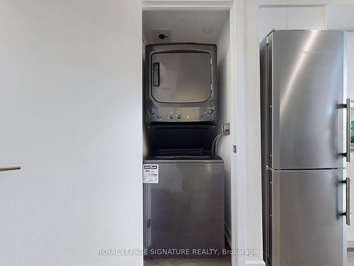 211-1401 O'Connor Dr, Toronto, ON - Indoor Photo Showing Laundry Room