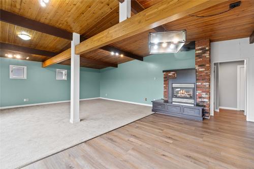 4636 East Vernon Road, Vernon, BC - Indoor Photo Showing Basement With Fireplace