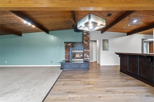 4636 East Vernon Road, Vernon, BC - Indoor Photo Showing Other Room With Fireplace