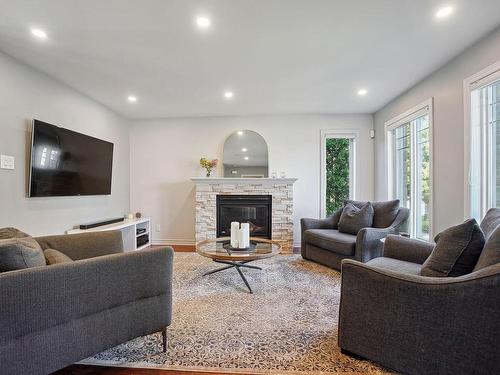 Salon - 29 Rue Paul-Chartrand, Saint-Philippe, QC - Indoor Photo Showing Living Room With Fireplace