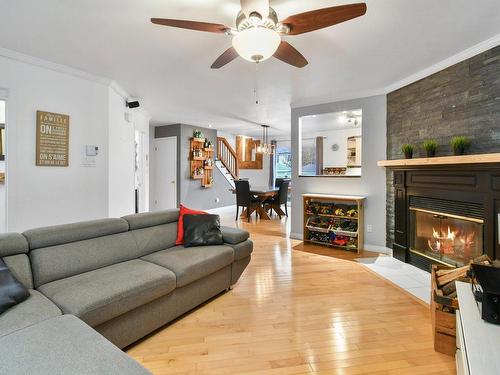 Salon - 881 Rue Einstein, Repentigny (Repentigny), QC - Indoor Photo Showing Living Room With Fireplace