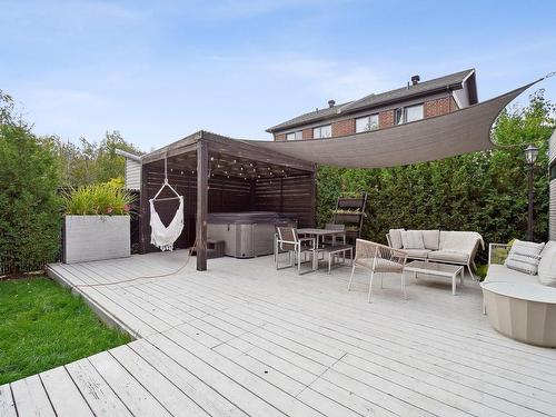 Backyard - 2492 Rue Marcel-Trudel, Longueuil (Le Vieux-Longueuil), QC - Outdoor With Deck Patio Veranda With Exterior