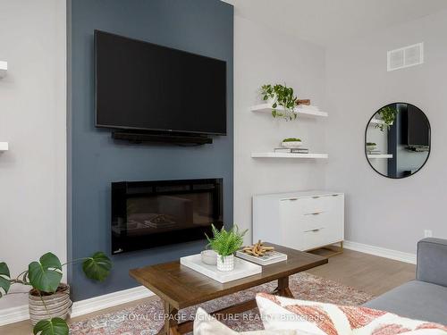 48 Severino Circ, West Lincoln, ON - Indoor Photo Showing Living Room With Fireplace