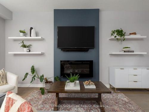 48 Severino Circ, West Lincoln, ON - Indoor Photo Showing Living Room With Fireplace