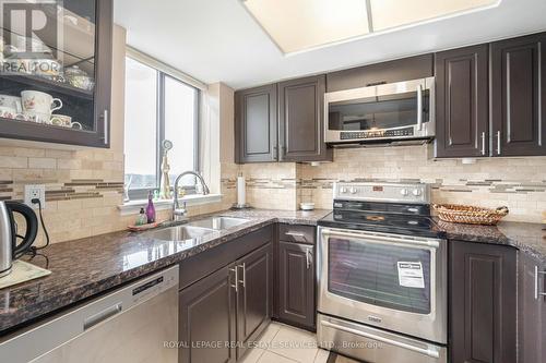 1707 - 4235 Sherwoodtowne Boulevard, Mississauga, ON - Indoor Photo Showing Kitchen With Double Sink