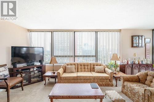 1707 - 4235 Sherwoodtowne Boulevard, Mississauga, ON - Indoor Photo Showing Living Room