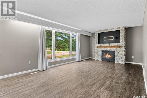 217 Conway Street, Mortlach, SK - Indoor Photo Showing Living Room With Fireplace