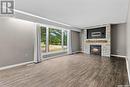 217 Conway Street, Mortlach, SK  - Indoor Photo Showing Living Room With Fireplace 