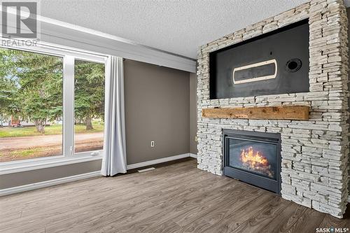 217 Conway Street, Mortlach, SK - Indoor Photo Showing Living Room With Fireplace