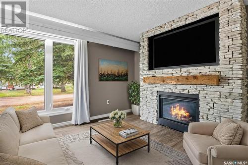 217 Conway Street, Mortlach, SK - Indoor Photo Showing Living Room With Fireplace