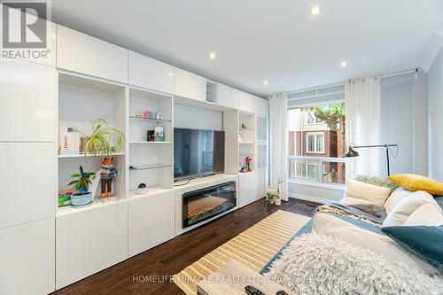 43 Festival Drive, Toronto, ON - Indoor Photo Showing Living Room With Fireplace