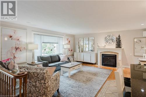 59 Pottawatomie Dr, Southampton, ON - Indoor Photo Showing Living Room With Fireplace